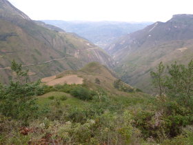Returning to Chachpoyas: View back to Kuélap.<br>The dirt road down is on the left.