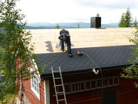 Continuing the Mounting of the Tar-Paper Shingle